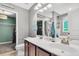 Bathroom with dual sink vanity, toilet and walk in shower at 5228 Fallow Fawns Rd, Hollywood, SC 29449