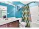 Charming bathroom with decorative elements, a sink, a toilet and a shower/bath at 5228 Fallow Fawns Rd, Hollywood, SC 29449