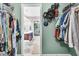 Walk-in closet leads to the main bath and is perfect for storage at 5228 Fallow Fawns Rd, Hollywood, SC 29449