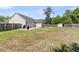 View of the backyard with shed and built-in barbeque pit at 5376 Copley Cir, Summerville, SC 29485