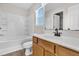 Well-lit bathroom with a bathtub/shower combo and a vanity with wood cabinets and a white countertop at 5376 Copley Cir, Summerville, SC 29485