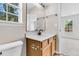 Bathroom featuring a single sink vanity with wood cabinets, a white countertop, and a large mirror at 5376 Copley Cir, Summerville, SC 29485