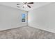 Carpeted bedroom with a ceiling fan and a window providing plenty of natural light at 5376 Copley Cir, Summerville, SC 29485