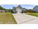 A long paved driveway leads to the home's attached garage at 5376 Copley Cir, Summerville, SC 29485