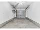 An empty garage with a ceiling fan and shelves at 5376 Copley Cir, Summerville, SC 29485