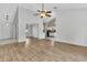 Open-concept living space featuring stylish flooring and seamless flow to the kitchen and entryway at 5376 Copley Cir, Summerville, SC 29485