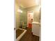 Bathroom features a glass shower, sink, and tile flooring at 622 Venning St, McClellanville, SC 29458