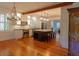 The kitchen has hardwood floors, stainless appliances, and a dark kitchen island at 622 Venning St, McClellanville, SC 29458