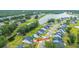 A charming home with lush landscaping is situated in a tranquil neighborhood near a lake at 7070 Pumpkinseed Dr, Johns Island, SC 29455