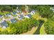 Charming home nestled within a vibrant community surrounded by lush trees and water features at 7070 Pumpkinseed Dr, Johns Island, SC 29455