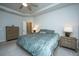The main bedroom showcases an en suite bathroom and ceiling fan at 7070 Pumpkinseed Dr, Johns Island, SC 29455