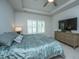 Primary bedroom features a ceiling fan and a large window at 7070 Pumpkinseed Dr, Johns Island, SC 29455
