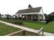 Community clubhouse with an outdoor seating area, perfect for social gatherings and events at 7070 Pumpkinseed Dr, Johns Island, SC 29455