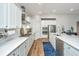 Modern kitchen featuring white cabinets, stainless steel appliances and a gas cooktop at 7070 Pumpkinseed Dr, Johns Island, SC 29455
