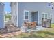 Outdoor patio space with a dining set and grill, perfect for backyard barbecues and relaxing at 7401 Purser Ln, Hanahan, SC 29410