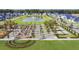 Aerial view of the Primary-planned community with pond, walking paths, and green spaces at 778 Clay Field Trl, Summerville, SC 29485