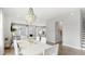 Open-concept dining room with stylish chandelier and ample natural light at 778 Clay Field Trl, Summerville, SC 29485
