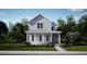 Charming two-story home featuring a welcoming front porch and beautiful landscaping at 778 Clay Field Trl, Summerville, SC 29485