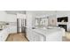 Open-concept kitchen with stainless steel appliances and a spacious island at 778 Clay Field Trl, Summerville, SC 29485