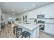 Modern kitchen with stainless steel appliances, granite countertops, and ample counter space, ideal for cooking and entertaining at 902 Twin Rivers Drive, Wando, SC 29492