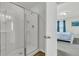 Bathroom features a walk-in shower with glass doors and a linen closet at 9706 Fanning Basket Ln, Ladson, SC 29456