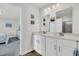 This bathroom is fitted with double sinks and ample storage space at 9706 Fanning Basket Ln, Ladson, SC 29456