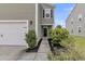 Charming home featuring a well-kept lawn, tidy shrubbery, and an inviting front entrance at 9706 Fanning Basket Ln, Ladson, SC 29456