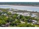 Overhead view of a charming coastal community with waterfront homes and beautiful marsh views at 1 Marlow Dr, Charleston, SC 29403