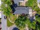 Aerial view of home with mature landscaping, a driveway, and a pergola covered parking area at 1 Marlow Dr, Charleston, SC 29403