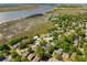 Beautiful aerial view of the home, trees, and surrounding neighborhood at 1 Marlow Dr, Charleston, SC 29403