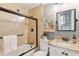 Bathroom with tiled shower, a patterned vanity top, and modern fixtures with natural light at 1 Marlow Dr, Charleston, SC 29403
