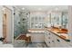 Luxurious bathroom featuring a walk-in shower with stunning blue tile and a double vanity at 1 Marlow Dr, Charleston, SC 29403