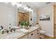 Bathroom featuring a double sink vanity with a granite countertop, tiled shower with glass door at 1 Marlow Dr, Charleston, SC 29403