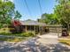 Well-maintained home featuring a screened porch and convenient golf cart parking at 1 Marlow Dr, Charleston, SC 29403