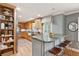 Modern kitchen with breakfast bar, stainless steel appliances, and custom cabinets, creating a chef's dream at 1 Marlow Dr, Charleston, SC 29403
