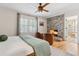 Inviting main bedroom featuring a brick fireplace, sitting area, and serene atmosphere at 1 Marlow Dr, Charleston, SC 29403