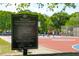 Sign welcomes visitors to Corrine Jones Playground with park rules and city contact information at 1 Marlow Dr, Charleston, SC 29403