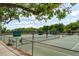 Outdoor tennis and basketball courts offer recreational opportunities in a lush, green setting at 1 Marlow Dr, Charleston, SC 29403