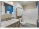 Well-appointed bathroom featuring a marble vanity, updated fixtures, and a shower-tub combo at 1006 Ibis Ct, Mount Pleasant, SC 29464