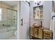 Modern bathroom with barn door, a vessel sink, and a glass-enclosed shower at 1006 Ibis Ct, Mount Pleasant, SC 29464