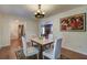 Cozy dining room featuring hardwood floors, stylish lighting and artwork at 1006 Ibis Ct, Mount Pleasant, SC 29464