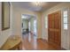 Warm and welcoming foyer with hardwood floors and decorative table at 1006 Ibis Ct, Mount Pleasant, SC 29464