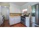 Well-lit kitchen featuring stainless steel appliances and ample cabinet space at 1006 Ibis Ct, Mount Pleasant, SC 29464