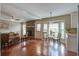Comfortable living room with brick fireplace and views of outdoor scenery at 1006 Ibis Ct, Mount Pleasant, SC 29464