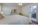 Comfortable main bedroom with bright lighting and ensuite bath entrance at 1006 Ibis Ct, Mount Pleasant, SC 29464