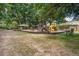 Community playground featuring a wooden climbing structure, slides, and shaded seating areas at 1006 Ibis Ct, Mount Pleasant, SC 29464