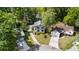 Aerial view of a home situated in a cul-de-sac surrounded by lush greenery and mature trees at 1016 Cider Ct, Summerville, SC 29483