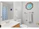 Bright bathroom featuring a decorative window, a shower-tub combo, and white towels at 1016 Cider Ct, Summerville, SC 29483