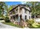 Charming two-story home featuring double porches and mature landscaping at 1016 Cider Ct, Summerville, SC 29483
