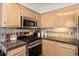 Well-equipped kitchen features stainless steel appliances and plenty of cabinet space at 1016 Cider Ct, Summerville, SC 29483